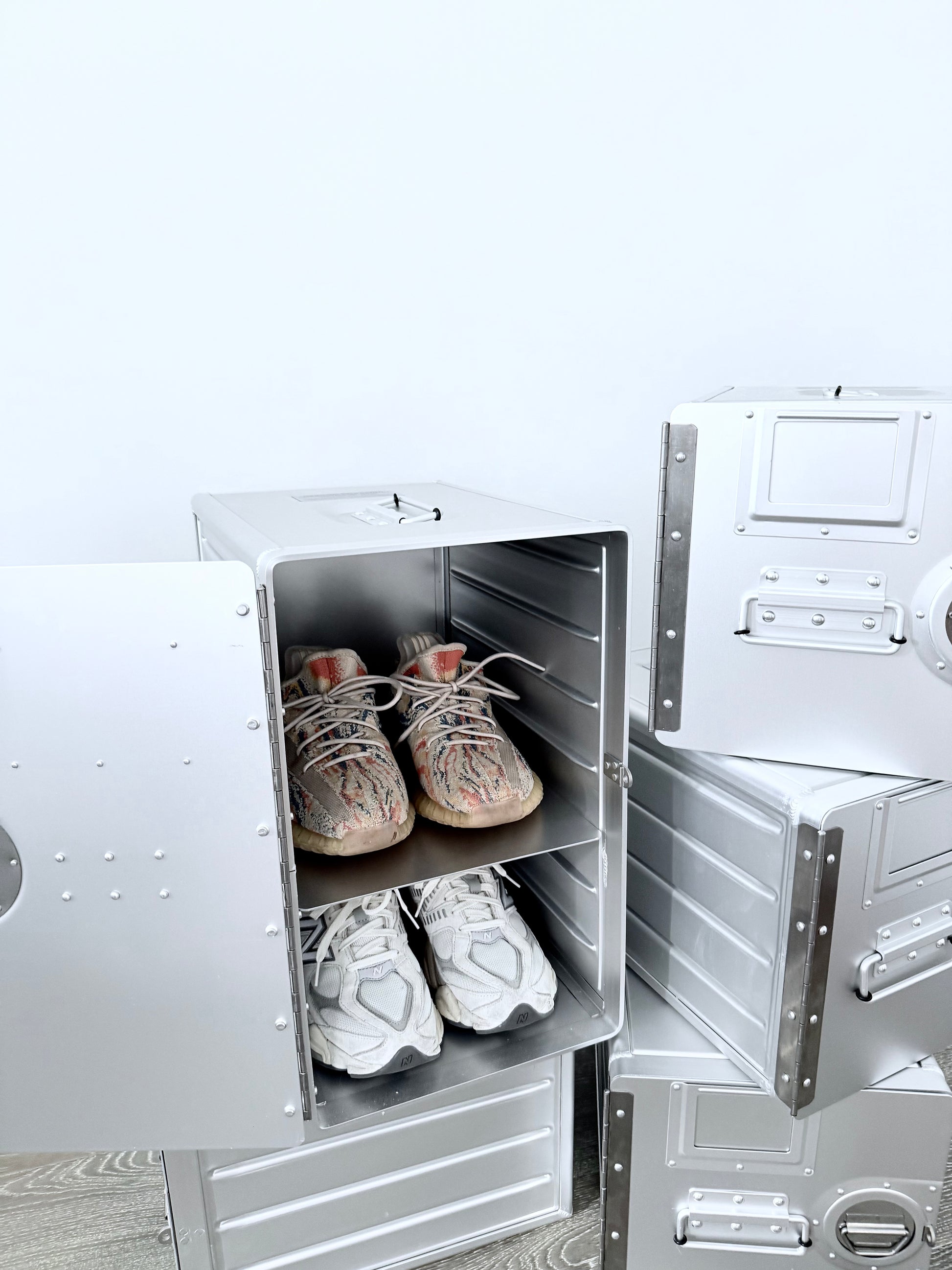 Concord Aero Cabinet Large, luxury aluminum cabinet with aviation-inspired design. Spacious storage for high-end homes, executive offices, and luxury home decor.