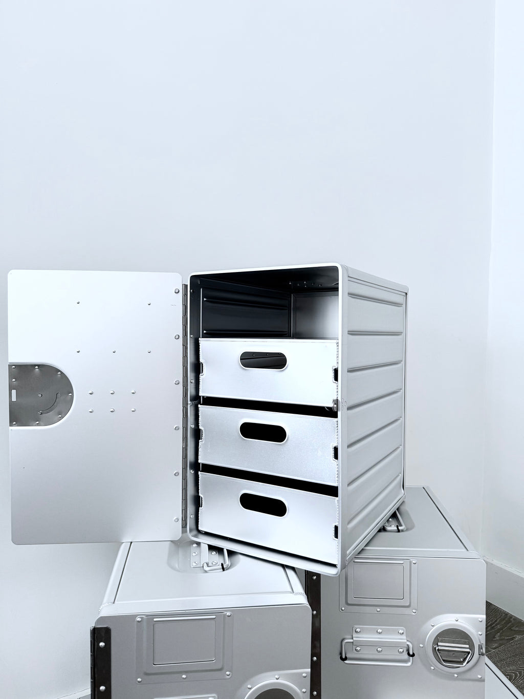 Concord Aero Cabinet Large, luxury aluminum cabinet with aviation-inspired design. Spacious storage for high-end homes, executive offices, and luxury home decor.