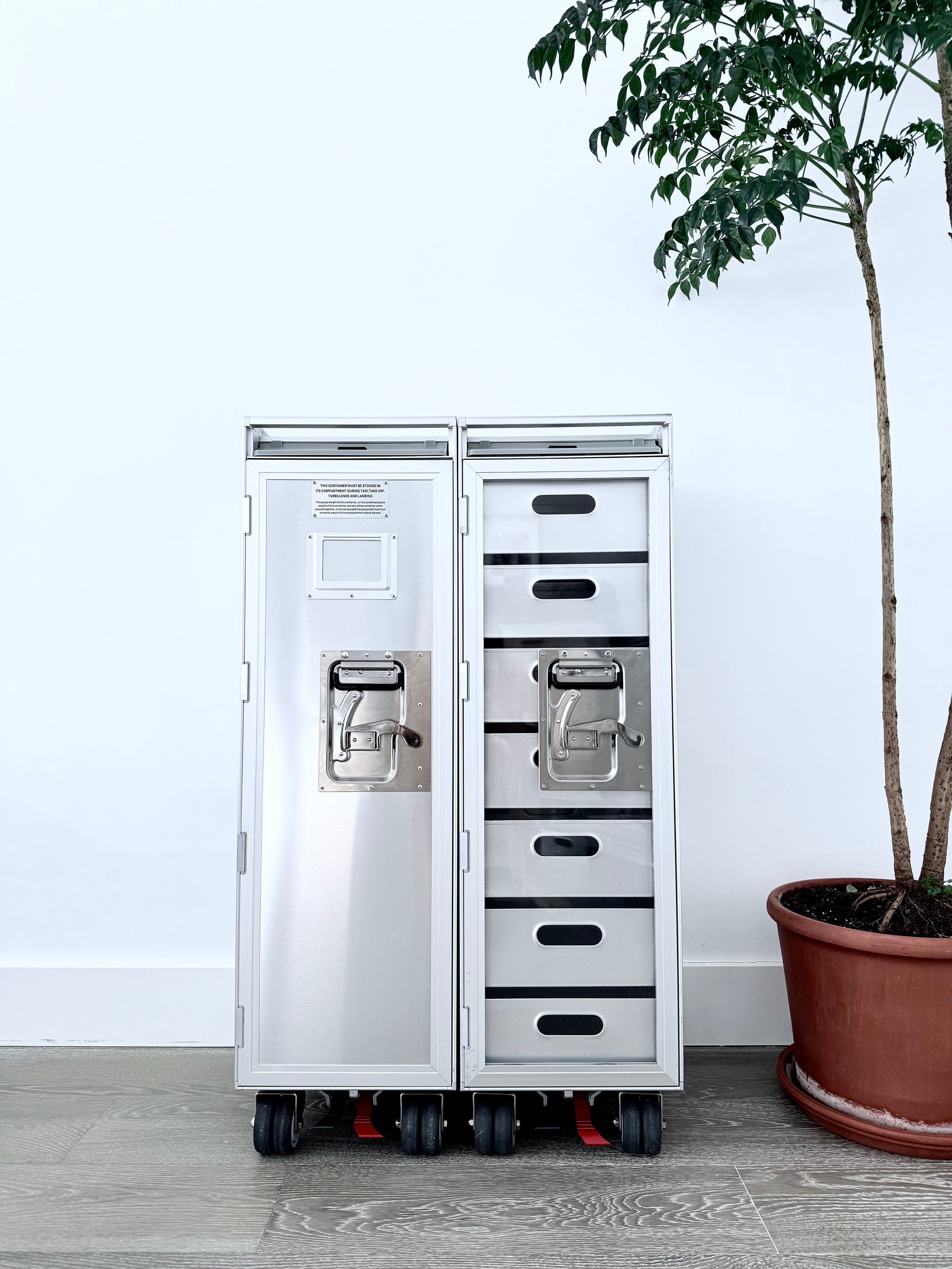 Concord Galaxy luxury trolley with aluminum door, aviation-inspired design in brushed aluminum. Perfect for high-end homes, executive offices, and luxury home decor.