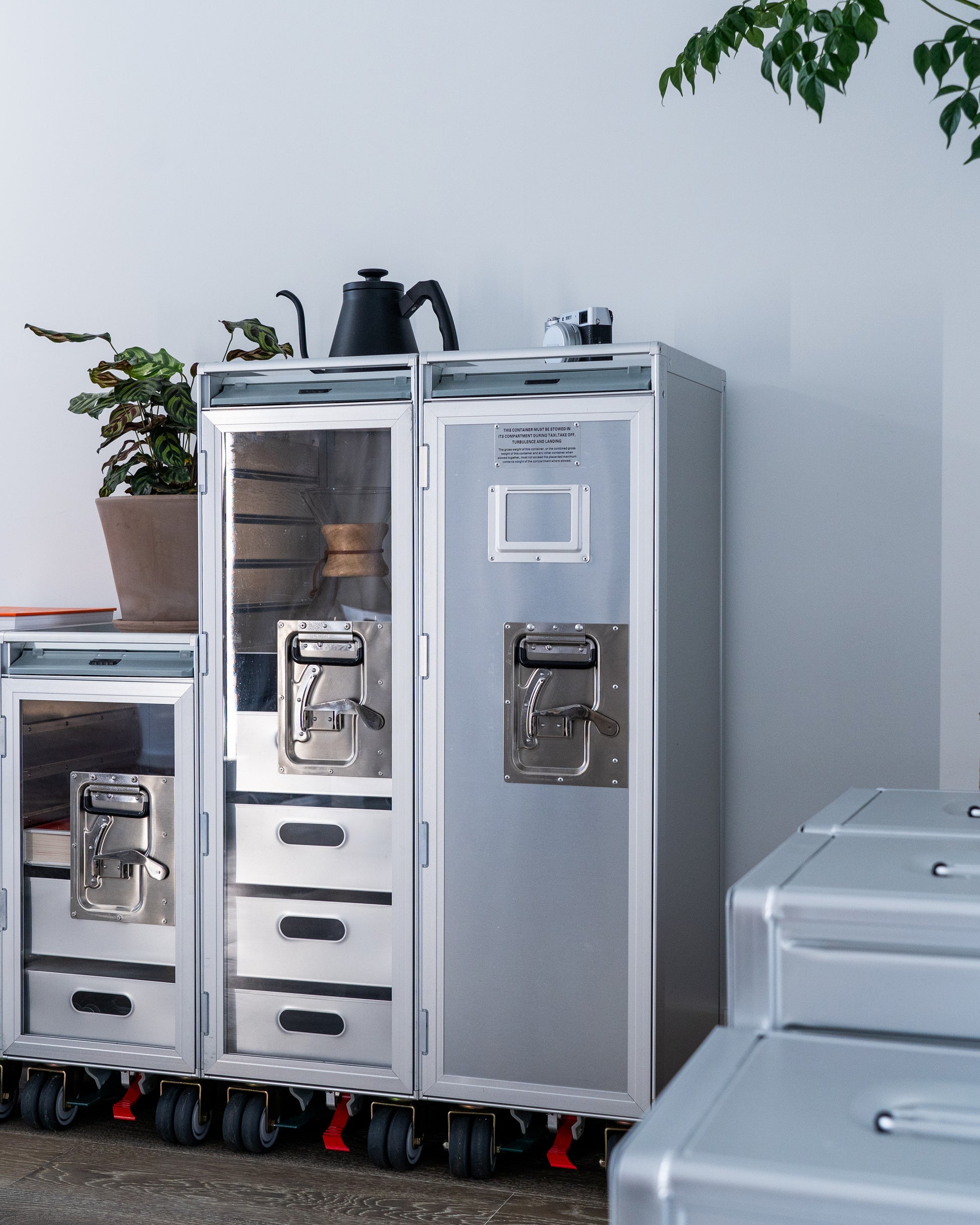 Concord Galaxy luxury trolley with aluminum door, aviation-inspired design in brushed aluminum. Perfect for high-end homes, executive offices, and luxury home decor.