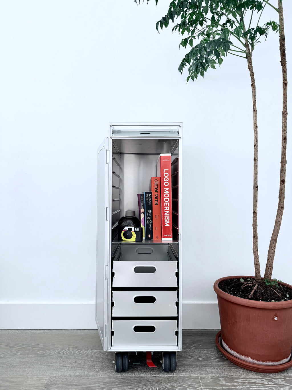 Concord Galaxy luxury trolley with aluminum door, aviation-inspired design in brushed aluminum. Perfect for high-end homes, executive offices, and luxury home decor.