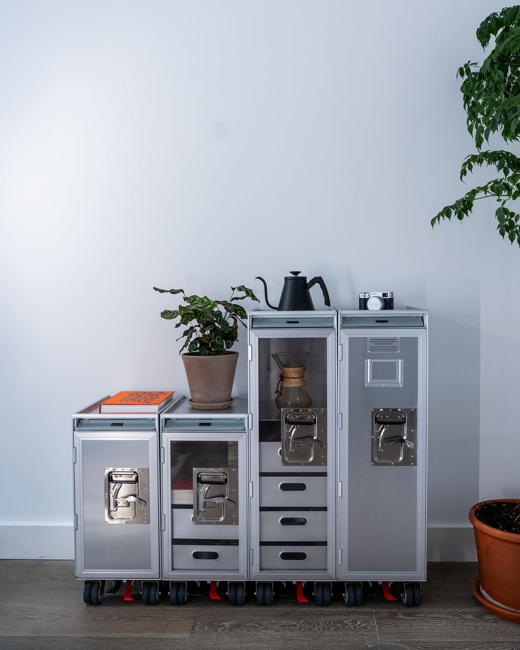 Concord Galaxy luxury trolley with aluminum door, aviation-inspired design in brushed aluminum. Perfect for high-end homes, executive offices, and luxury home decor.