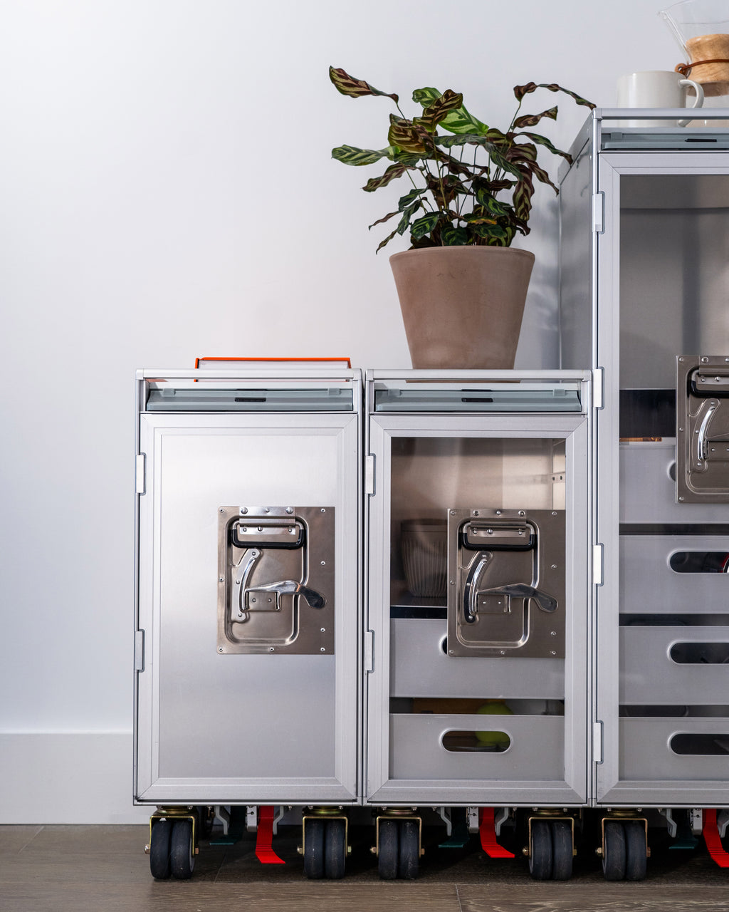 Concord Hercules S luxury trolley, features a glass door, aviation-inspired design in brushed aluminum. Compact for high-end homes, executive offices, and under office tables, or serve as a nightstand, ideal for luxury home decor.